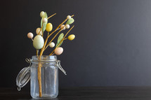 jar with Easter eggs branches 