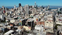 The Tenderloin District and San Francisco City Skyline