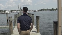 man walking on a dock 