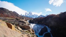 Mount Fitz Roy showing though secret waterfall in Patagonia Argentina, El Chalten town.
