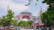 Turkey Istanbul, May 2023: Awesome view of scenic fountain at the Sultanahmet Square and the Hagia Sophia in Istanbul, Turkey. The Sultanahmet Square is a popular tourist attraction of the world.
