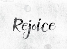 word rejoice in ink on white background 