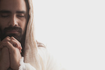 The resurrected Christ -- Jesus praying.