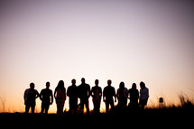 silhouettes, group, people, row, standing, field, outdoors 