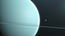 Planet Uranus and Rings in Outer-space. - Zoom-out animation