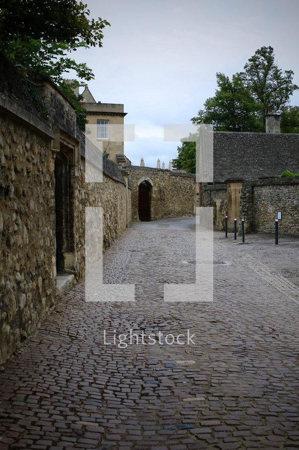 stacked stone walls and cobblestone streets in Oxford 