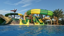 Large water slides and a pool at a water park