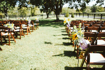 rows of chairs for an outdoor wedding 
