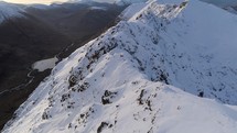 Snow Covered Mountain Summit in Scotland During the Winter