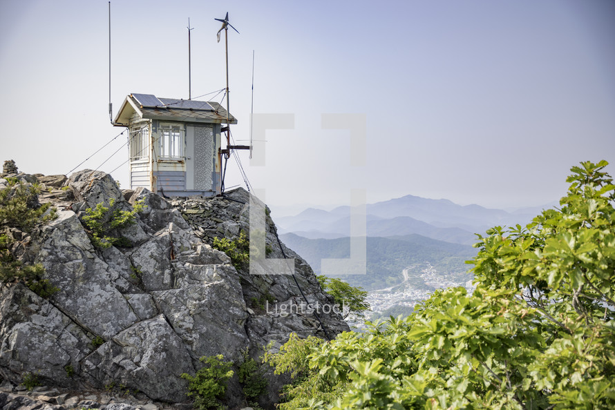 A lookout post on a mountain top view of the Korean coast