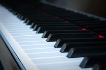 Low perspective of piano keys close-up horizontal