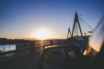 cars driving across a bridge 