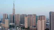 Aerial shot from flying drone of modern buildings and skyscrapers in financial district of Ho Chi Minh
