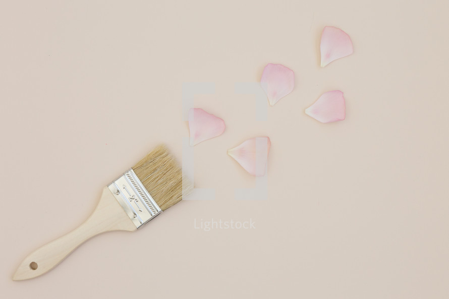 paint brush and pink petals 