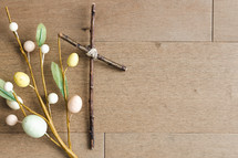 cross of sticks and Easter egg spray 