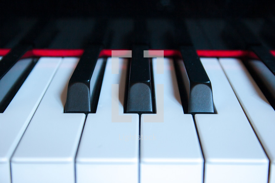 Sharp, natural, and flat piano keys close-up horizontal