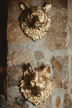 gold wolf and bear head decor 