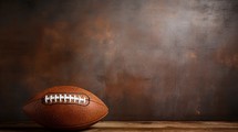 Football on wood and brown background