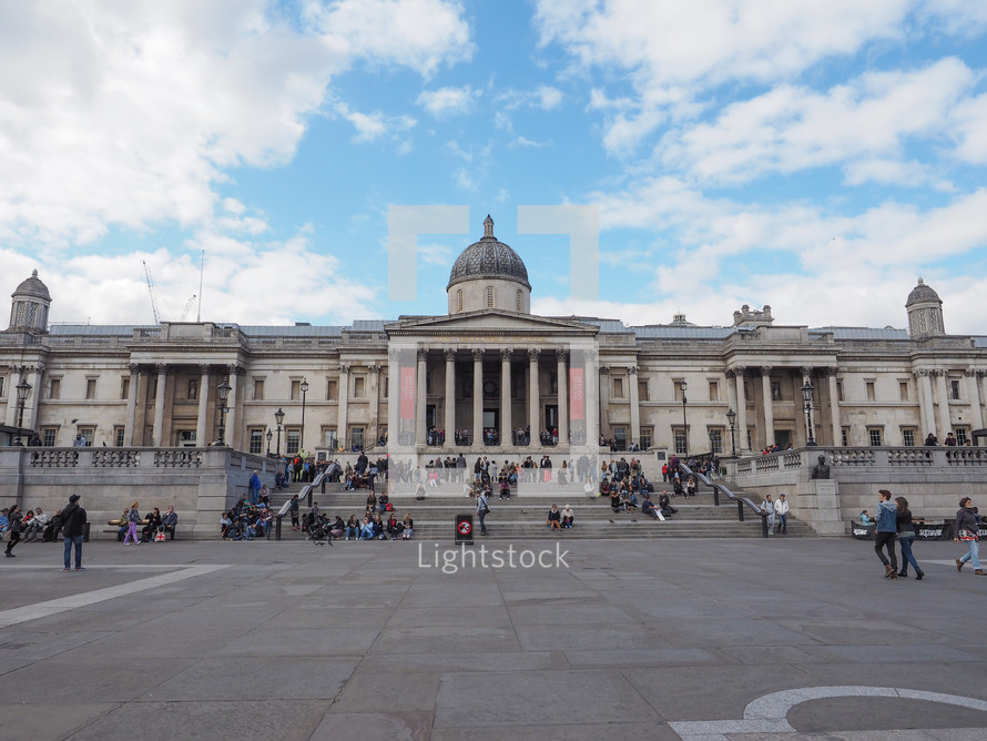 LONDON, UK - JUNE 09, 2015: Tourists visiting Trafalgar Square in front of the National Gallery