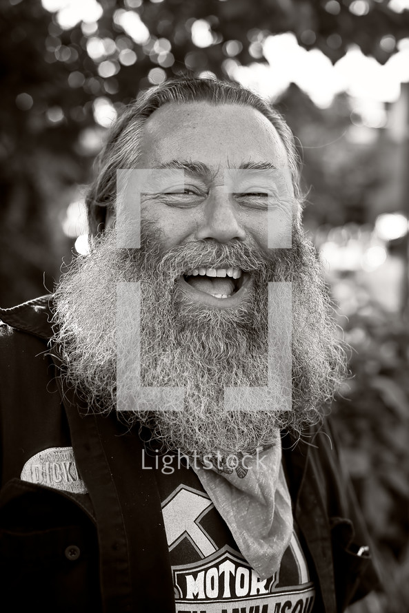 happy man with a long heavy beard