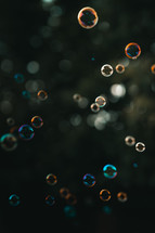 Bubbles floating in the air, colourful liquid bubble