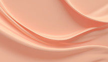 curves of draped silky fabric in light peach color