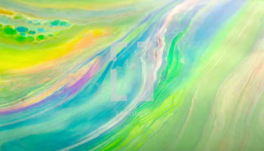 flowing paint effect in blue, green, yellow