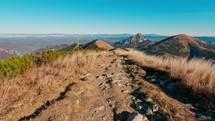 Timelapse, walking along the mountain ridge in the national park. Idyllic Carpathian nature in autumn on a sunny day