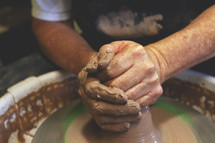 potter at a potters wheel 