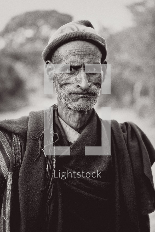 older man wearing a hat