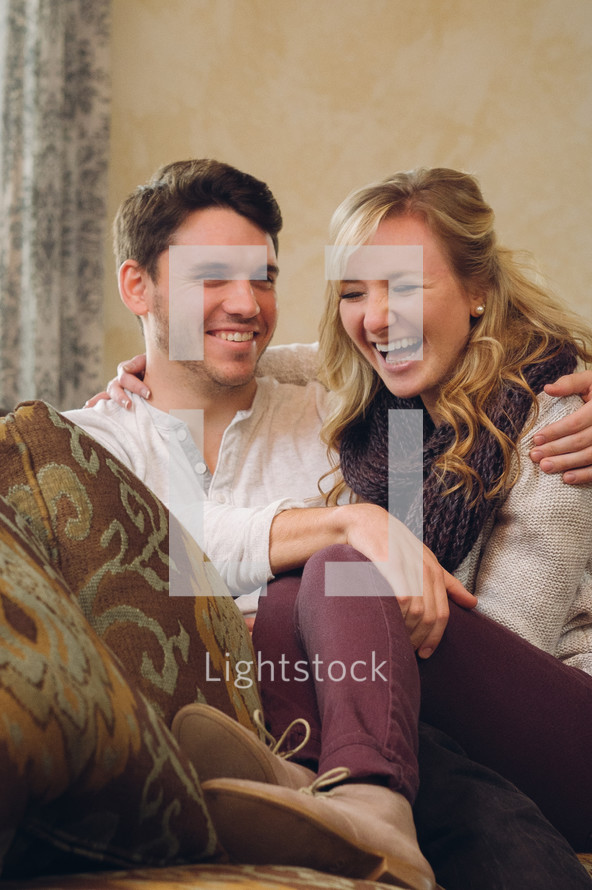couple laughing together 