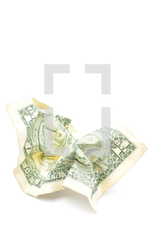 wadded up dollar bill 