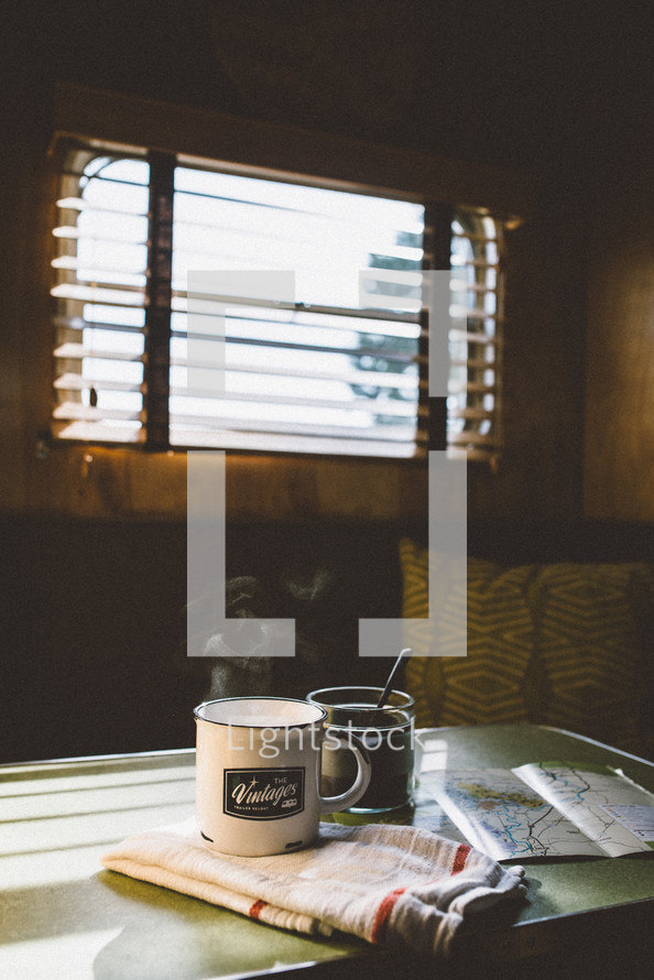 coffee mug on a table in a camper 