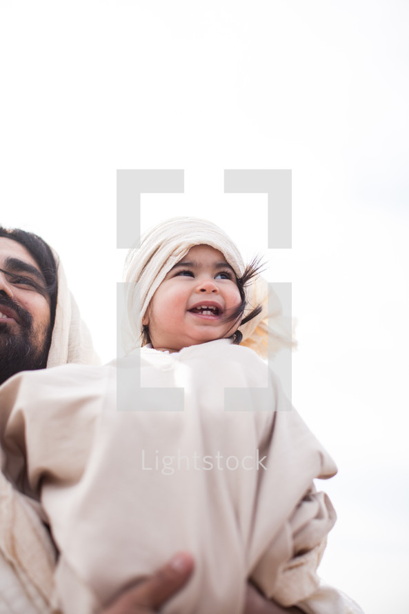 Jesus holding a child 