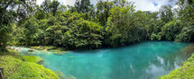 A view of the luminous blue Rio Celeste in Costa Rica