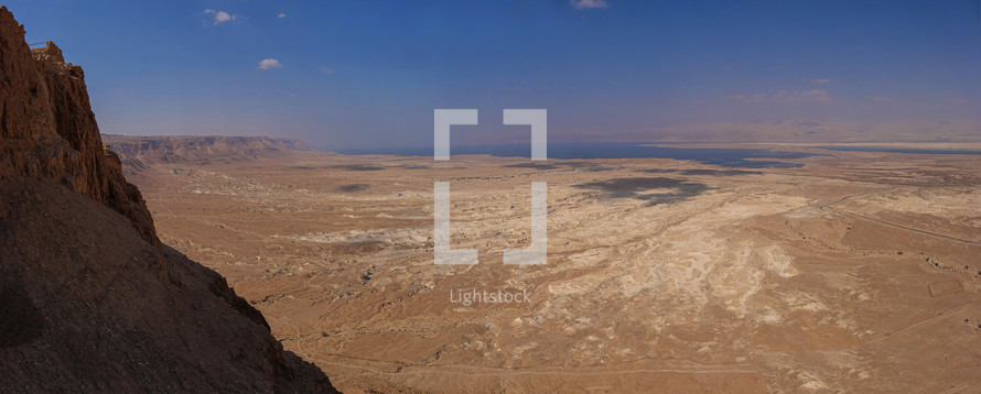 The desert below the feet of the mountain where the Masada Fortress is located. 