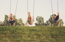 girls on swings 