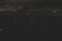 Rows of theater chairs.