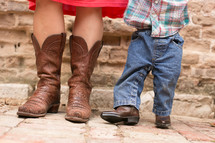 A Mom and Son wearing cowboy boots