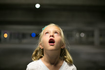 amazed little girl with her mouth open