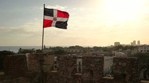 Dominican Republic flag over city