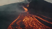 Lava from active erupting Pacaya volcano in Guatemala. Drone aerial sunrise shot	