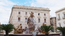 Ancient baroque fountain in Siracusa, Sicily
