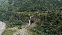 Drone shot of Aerial Of Bride's Veil Waterfall (Manto de la Novia) In Baños, Ecuador.