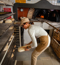 Daily production of bread baked with wood oven with traditional method
