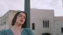 Girl smoking in the streets of Italy