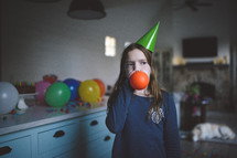little girl at a birthday party 