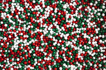 red, green, and white Christmas sprinkles 