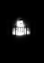  light at the end of a dark hallway