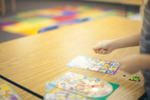 child playing a board game 